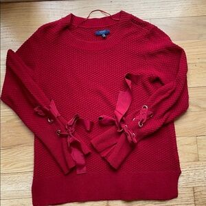 {Kaari Blue} Red Sweater with Tie Sleeves